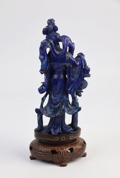 null CHINE, XXème siècle.

Quatre statuettes en lapis-lazuli représentant trois femmes...
