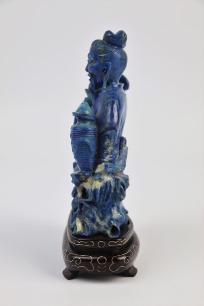 null CHINE, XXème siècle.

Quatre statuettes en lapis-lazuli représentant trois femmes...