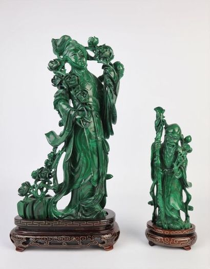 CHINE, XXème siècle.

Deux statuettes en...