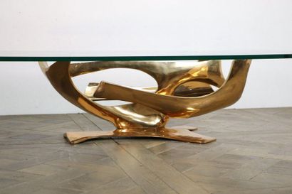  Fred BROUARD (1944-1999). 
Table basse - c.1970 
Bronze patiné et verre. 
Modèle...