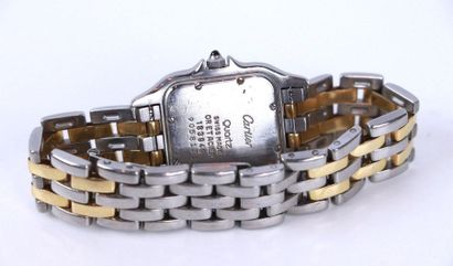 null CARTIER.

Montre bracelet de dame ou d'homme, en or et acier, N°183949. Cadran...