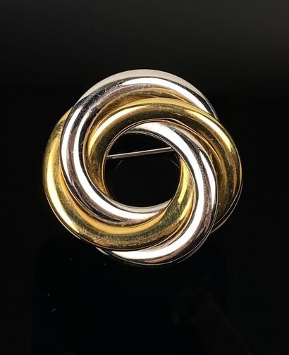 null Broche en or jaune et or blanc, circulaire à trois anneaux.

D_4 cm. 

19,29...
