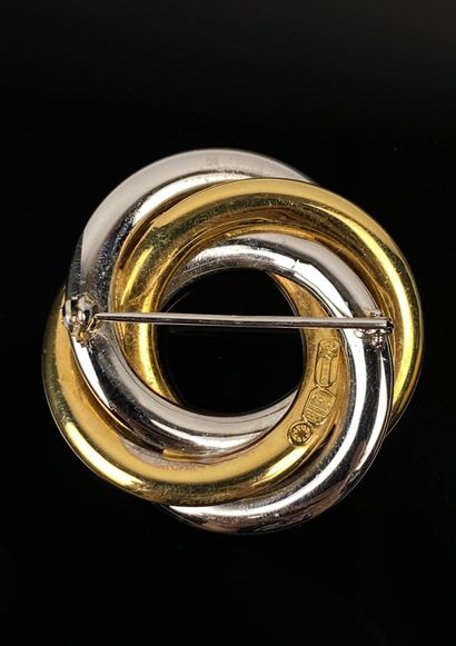 null Broche en or jaune et or blanc, circulaire à trois anneaux.

D_4 cm. 

19,29...