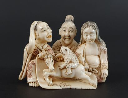 null JAPON, début du XXème siècle.

Netsuke en ivoire sculpté figurant trois personnages...