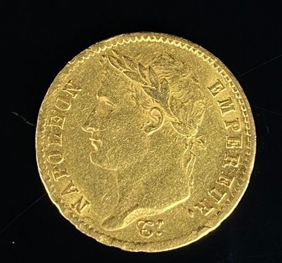 Une pièce de 20 francs or, 1808 (A). 
Epoque...