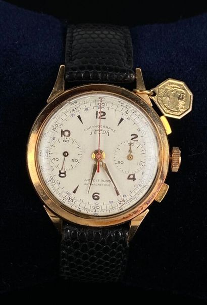 null TELDA.

Montre chronographe en or jaune, à deux compteurs.

Années 1950.

Bracelet...