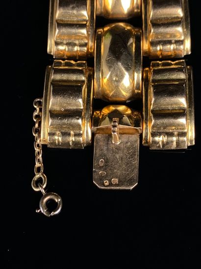  Bracelet tank en or jaune. 
L_19,5 cm. 
80,11 grammes, 18K, 750°/00