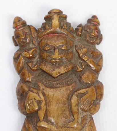 null Small Indian sculpture of a man holding two children on his shoulders

Bone

India,...
