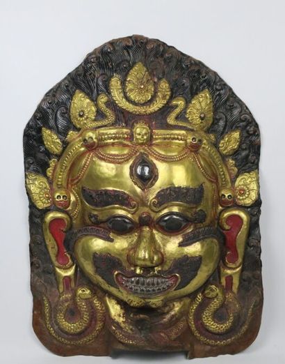 null TIBET, XIXème-XXème siècle.

Importante Tête de Bhairava

Cuivre repoussé, doré...