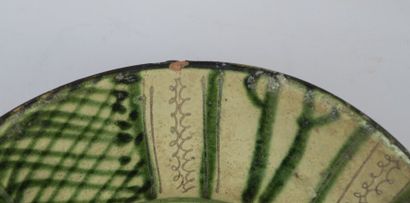 null Two Persian cups

Siliceous paste with incised and painted green decoration...