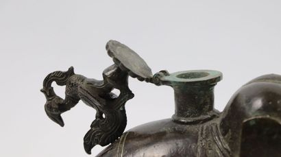 null Elephant

Bronze

India, Deccan, 18th century

An amusing bronze vessel in the...