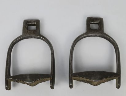 null Pair of stirrups

Steel partly inlaid with silver

Himalaya, 19th century

Steel...
