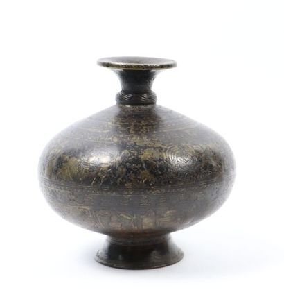 null Two vases 

Brass

India, 18th - 19th century 

A lota with a beautiful black...