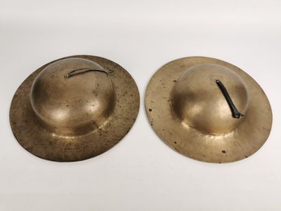 null Two pairs of cymbals.

Brass and leather.

Tibet.

H_ 4.8 cm W_ 21.7 cm

H_...