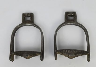 null Pair of stirrups

Steel partly inlaid with silver

Himalaya, 19th century

Steel...