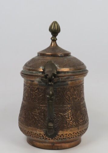 null Samovar and Kashmir pot

Tinned copper 

Kashmir, 19th century

With hammered...