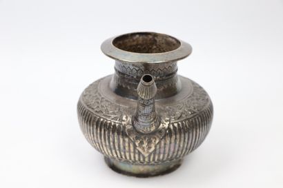 null Lota Kindi 

Silver

India, 19th century 

Decorated with gadroons and a chased...