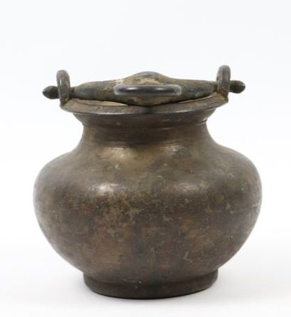 null Lota and oil lamp

Cast brass

India, 19th century

A lota with a globular body...