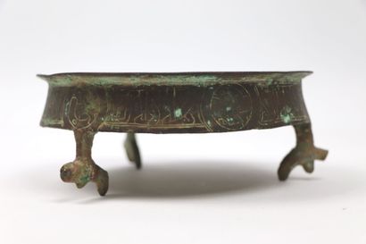 null Small tripod bowl

Bronze or cast brass

Iran, Seljuq period 

The inside is...