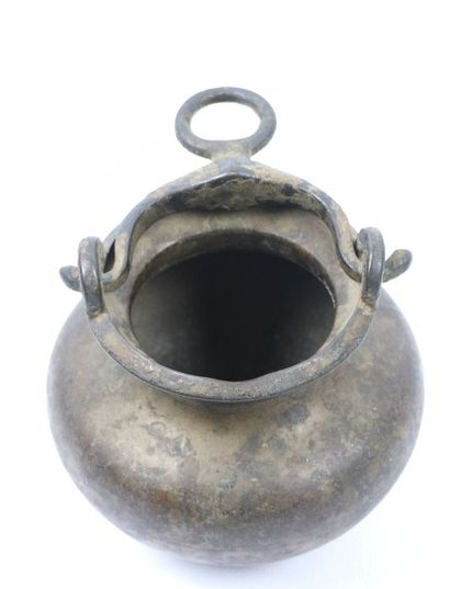 null Lota and oil lamp

Cast brass

India, 19th century

A lota with a globular body...