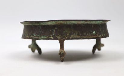 null Small tripod bowl

Bronze or cast brass

Iran, Seljuq period 

The inside is...