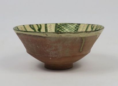 null Two Persian cups

Siliceous paste with incised and painted green decoration...