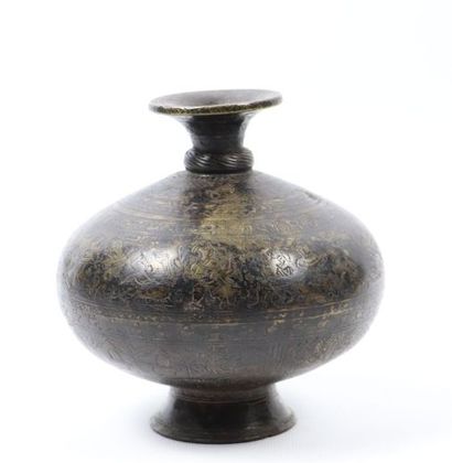 null Two vases 

Brass

India, 18th - 19th century 

A lota with a beautiful black...