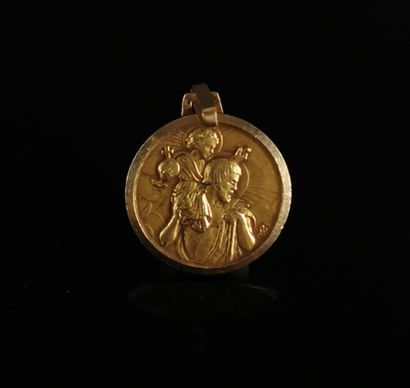 null Trois médailles religieuses en or jaune.

7,36 grammes, 18K, 750°/00