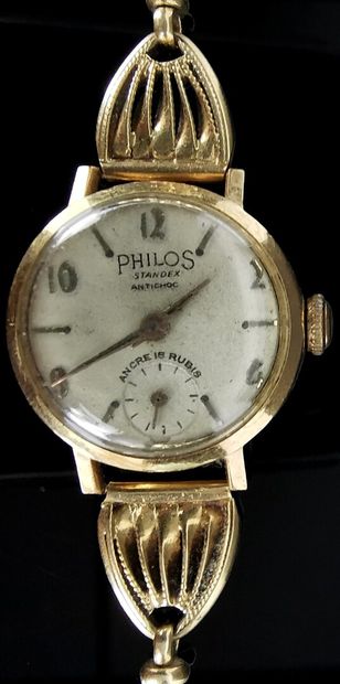 null Montre de bracelet en or jaune, le cadran signé Philos.

L_16,5 cm.

Poids brut...