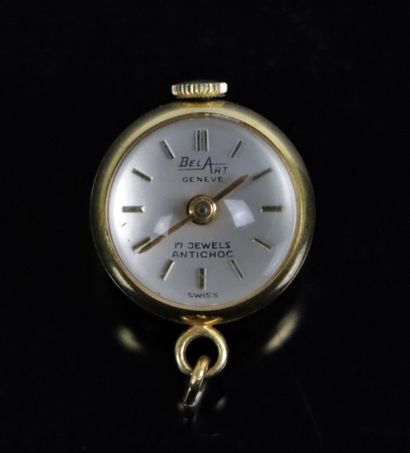 null Petite montre pendentif en or, le mouvement squelette visible. 

D_1,8 cm. 

Poids...