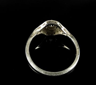 null White gold ring set with a brilliant-cut diamond weighing approximately 0.08...