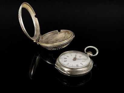null Silver and gilt collar watch.

Louis XV style, 19th century.

With the key.

L_...