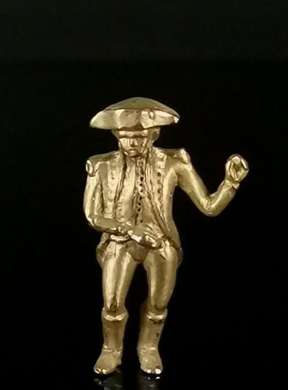 null Figurine en métal doré figurant Napoléon au bicorne, le bras levé. 

H_4 cm