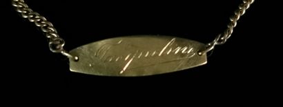 null Curb of child in yellow gold, engraved "Jacqueline".

L_13 cm.

1,59 grams,...
