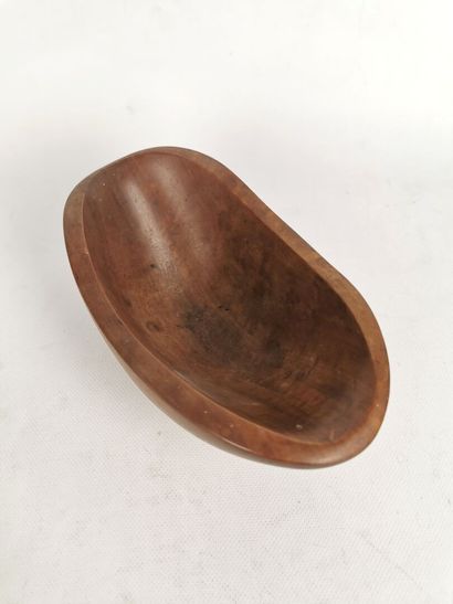 null Alexandre NOLL (1890 - 1970).

Hollow cup of free form, c.1950.

Walnut.

Signed...