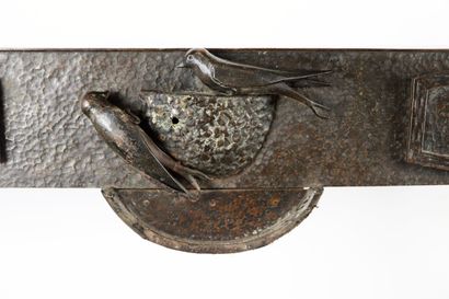 null French work from the 20th century.

Bronze and hammered copper console with...