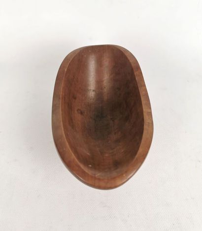 null Alexandre NOLL (1890 - 1970).

Hollow cup of free form, c.1950.

Walnut.

Signed...