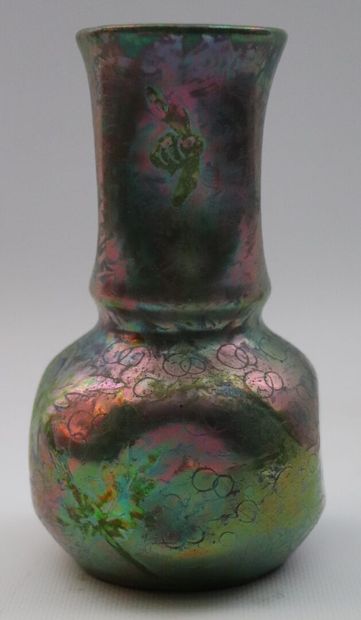 null AIRE-BELLE.

A baluster vase with iridescent glazed ceramic flats decorated...