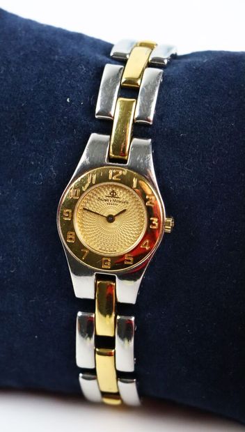 null BAUME et MERCIER, Genève.

Montre de dame en acier et plaqué or, modèle Linéa.

D_23...