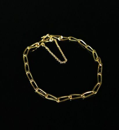 null Bracelet en or jaune, chainette de sécurité.

L_18,5 cm.

6,18 grammes, 18K,...