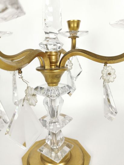 null BACCARAT.

Paire de girandoles en bronze doré et cristal, à quatre lumières.

Signées...