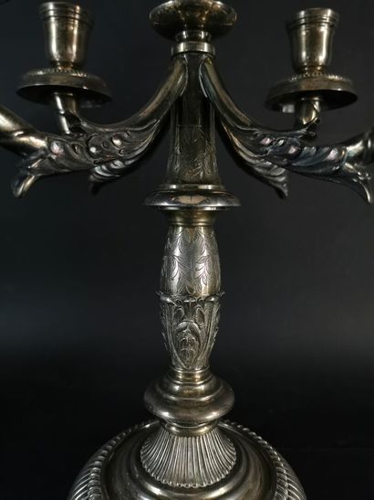 null ORTEGA, Mexico.

Pair of silver candelabras with five lights.

The base resting...