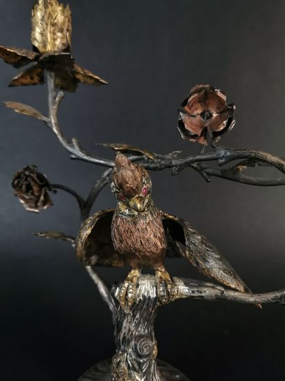 null TANE, Mexico.

Pair of candelabras in silver partially gilded and pinkish, representing...