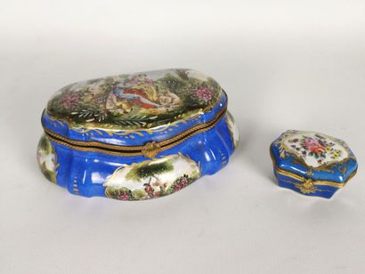 null Two boxes, the largest in porcelain with polychrome decoration of gallant scenes,...