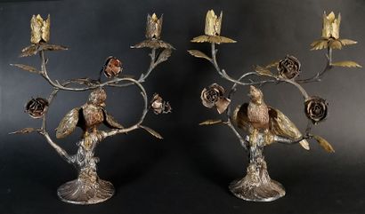 null TANE, Mexico.

Pair of candelabras in silver partially gilded and pinkish, representing...