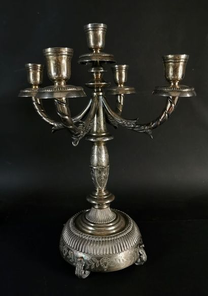 null ORTEGA, Mexico.

Pair of silver candelabras with five lights.

The base resting...