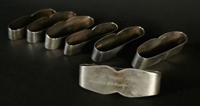 null SANBORNS, Mexico.

Set of seven silver napkin rings engraved with the names...