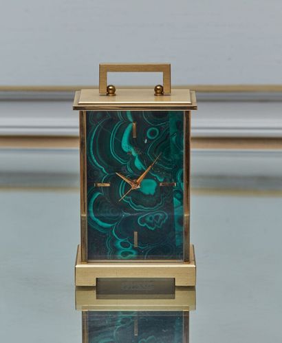 null PONTIFA.

Clock in bronze, the bottom of the dial in malachite.

H_12 cm W_7,5...