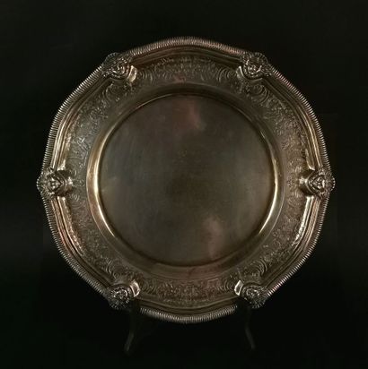 null MEXICO.

Silver dish chased and decorated with repeated masks in relief, engraved...