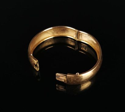 null Bracelet jonc en or jaune.

L_6,1 cm l_1,5 cm.

15,65 grammes, 18K, 750°/00